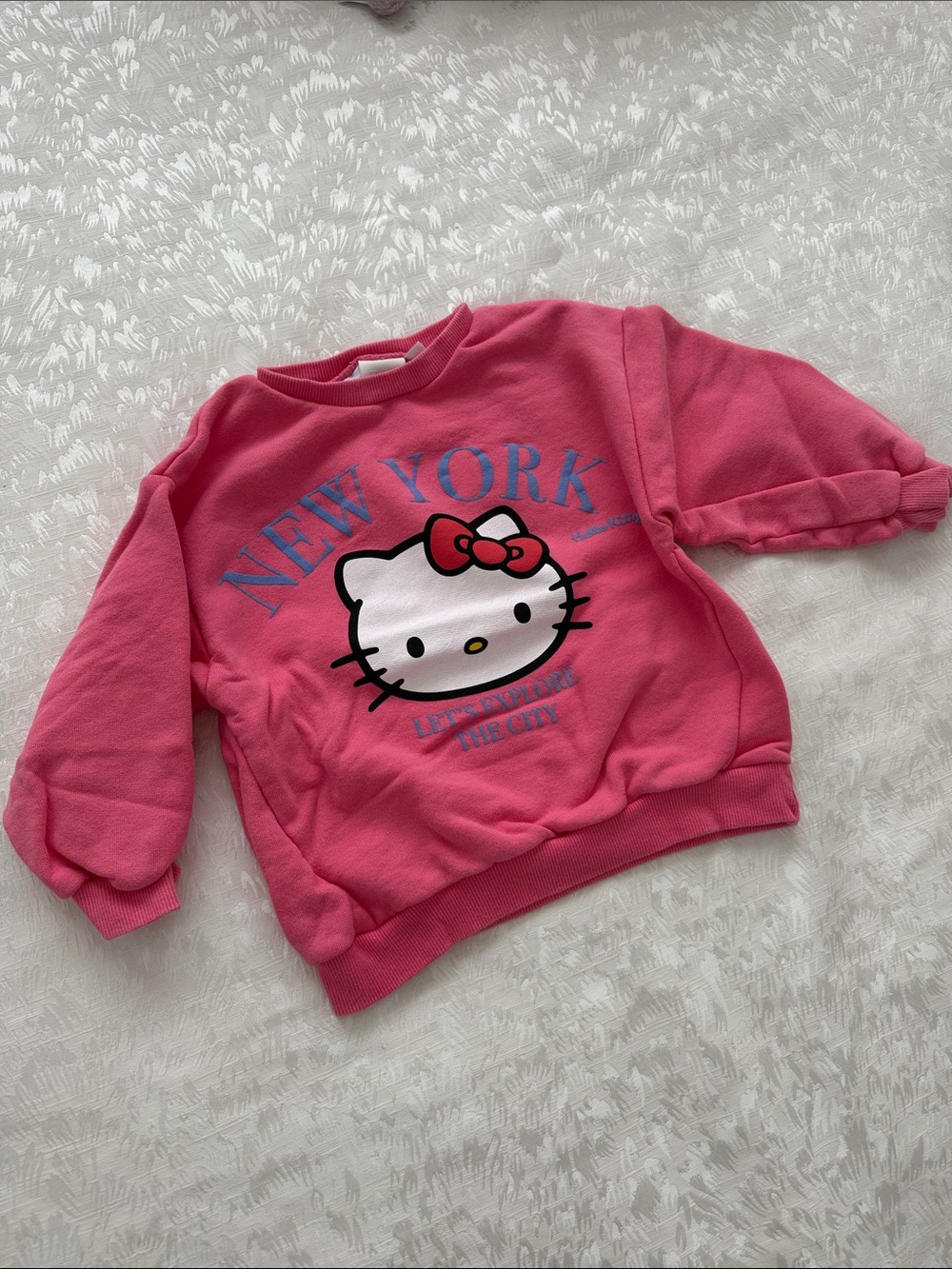 Zara Pink Hello Kitty Sweatshirt with Blue New York Graphic